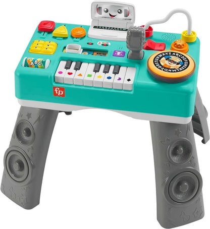 A teal and gray Fisher-Price musical activity station with a keyboard -  microphone -  ABC dial -  and smiling screen