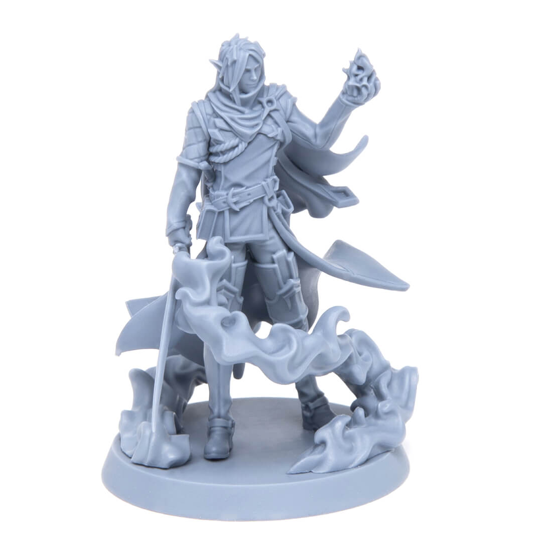 Unpainted grey fantasy miniature of an elf holding a staff and a glowing skull, surrounded by swirling mist.
