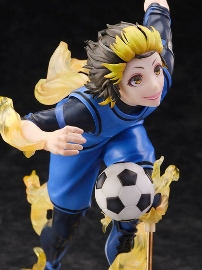 Dynamic action figure of a soccer player in a blue uniform kicking a ball