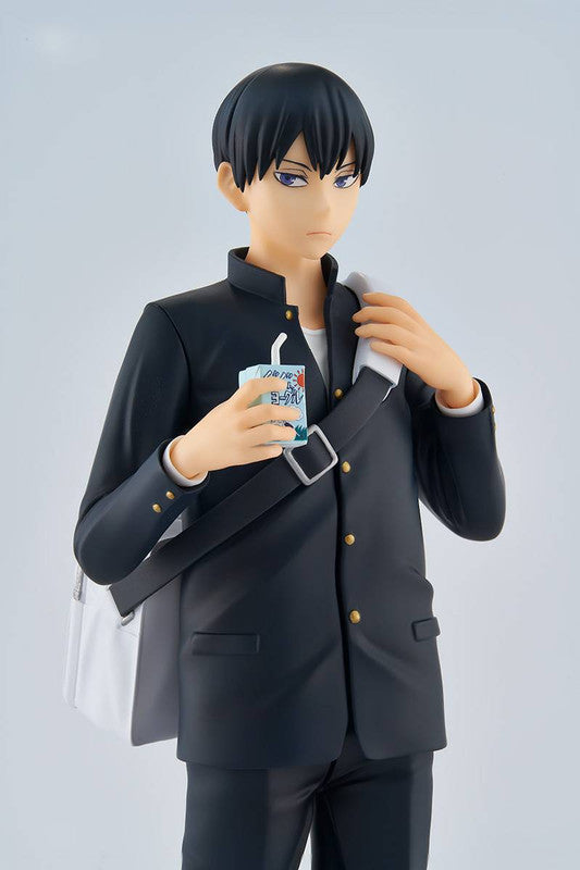 Anime figure of Kageyama from Haikyu in a black school uniform with a white bag and milk carton