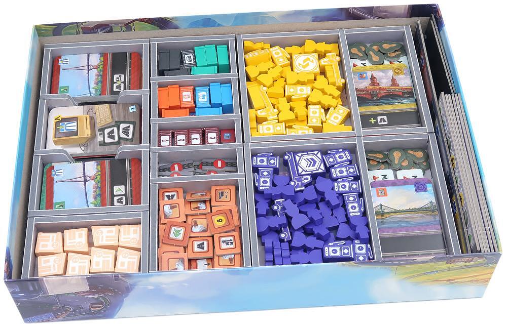 Folded game insert organizer showing compact storage design