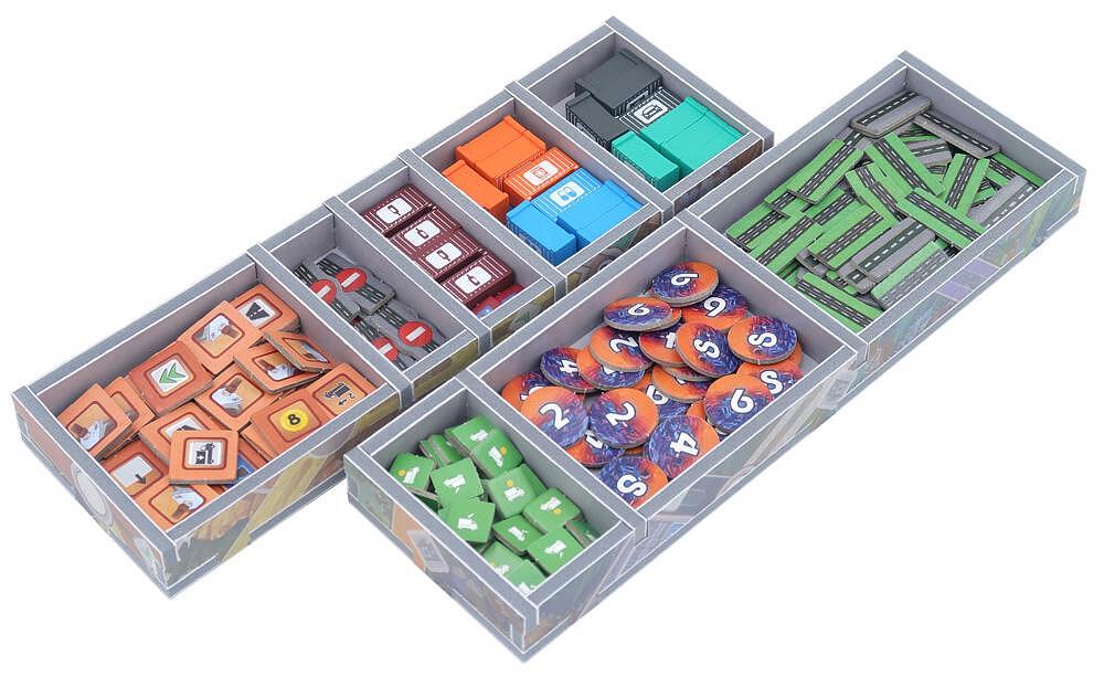Black foam organizer insert filled with neatly arranged game parts