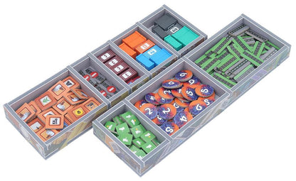 Black foam organizer insert filled with neatly arranged game parts