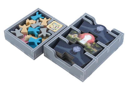 Insert compartments arranged with player pieces