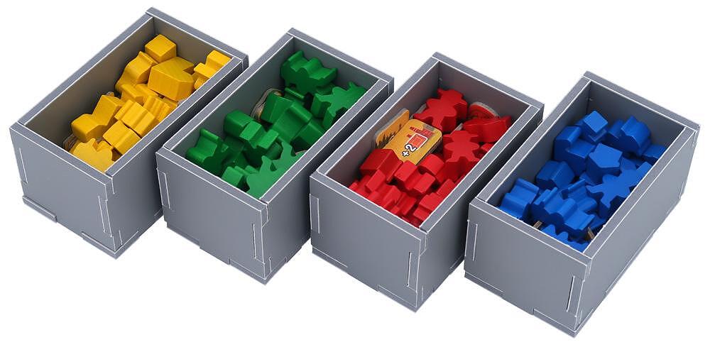 Top-down view of the Boonlake insert with game components arranged