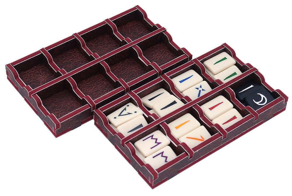 Insert folded open with game tokens and cards placed