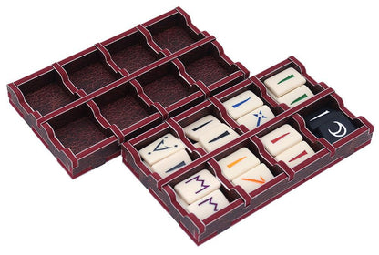 Insert folded open with game tokens and cards placed