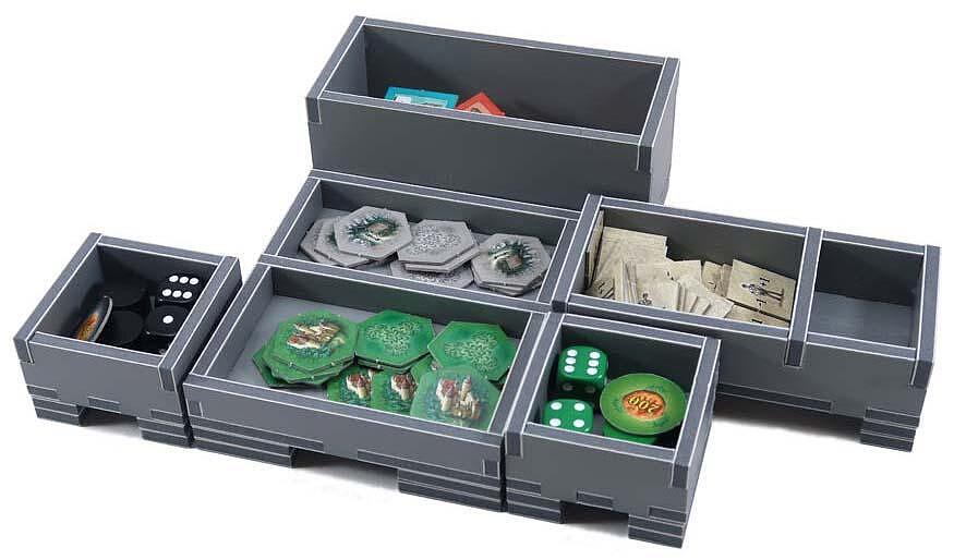 Folded Space organizer insert with neatly arranged game components ready for storage
