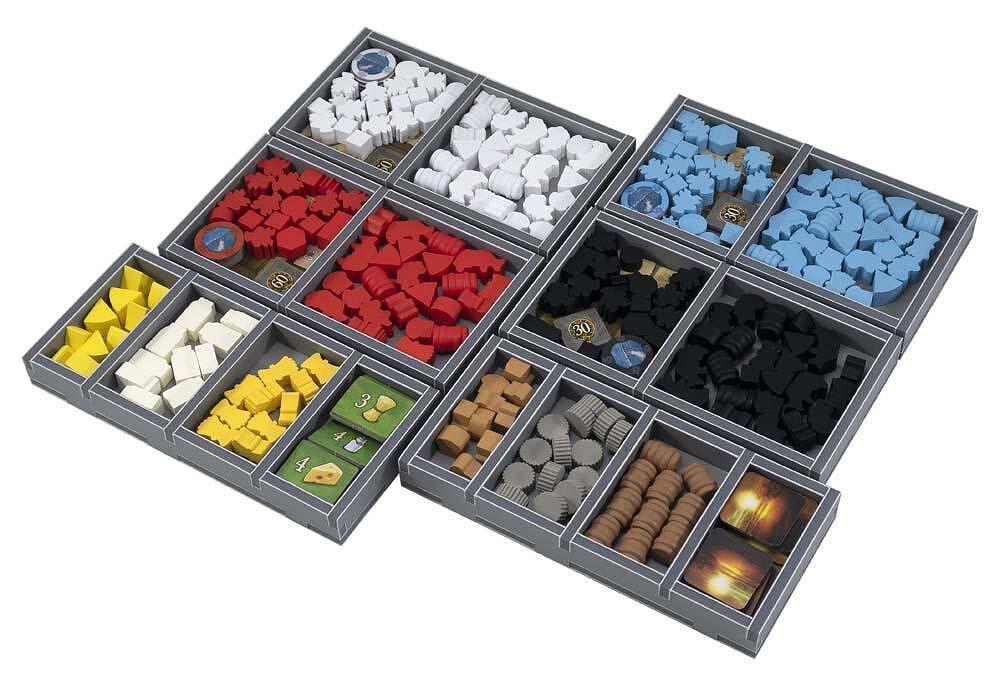 Folded Space Clans of Caledonia organizer with game pieces sorted in compartments