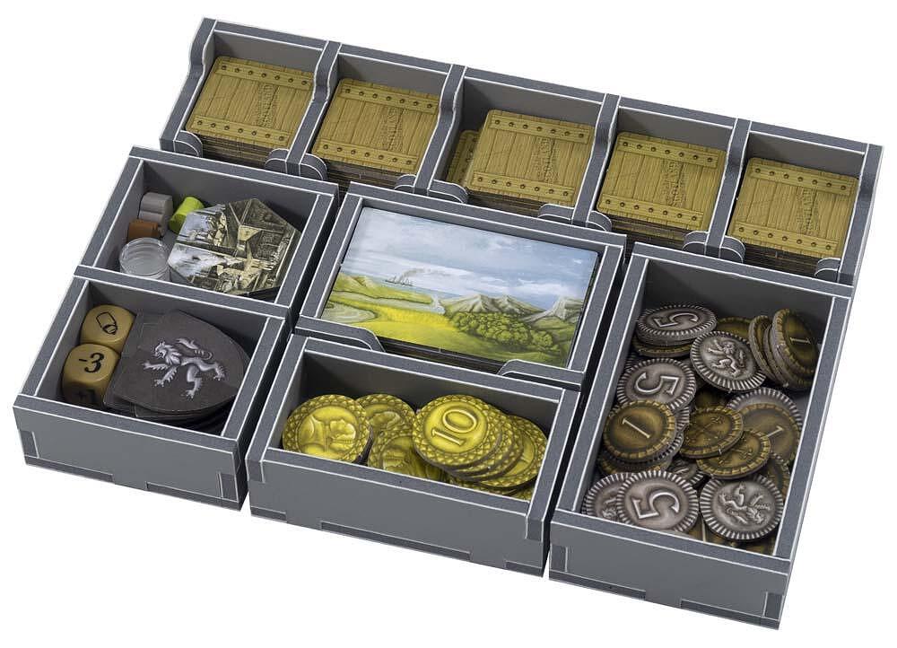 Folded Space game insert displaying the Clans of Caledonia setup inside the box