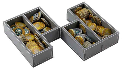 Folded Space insert trays arranged outside the Five Tribes game box