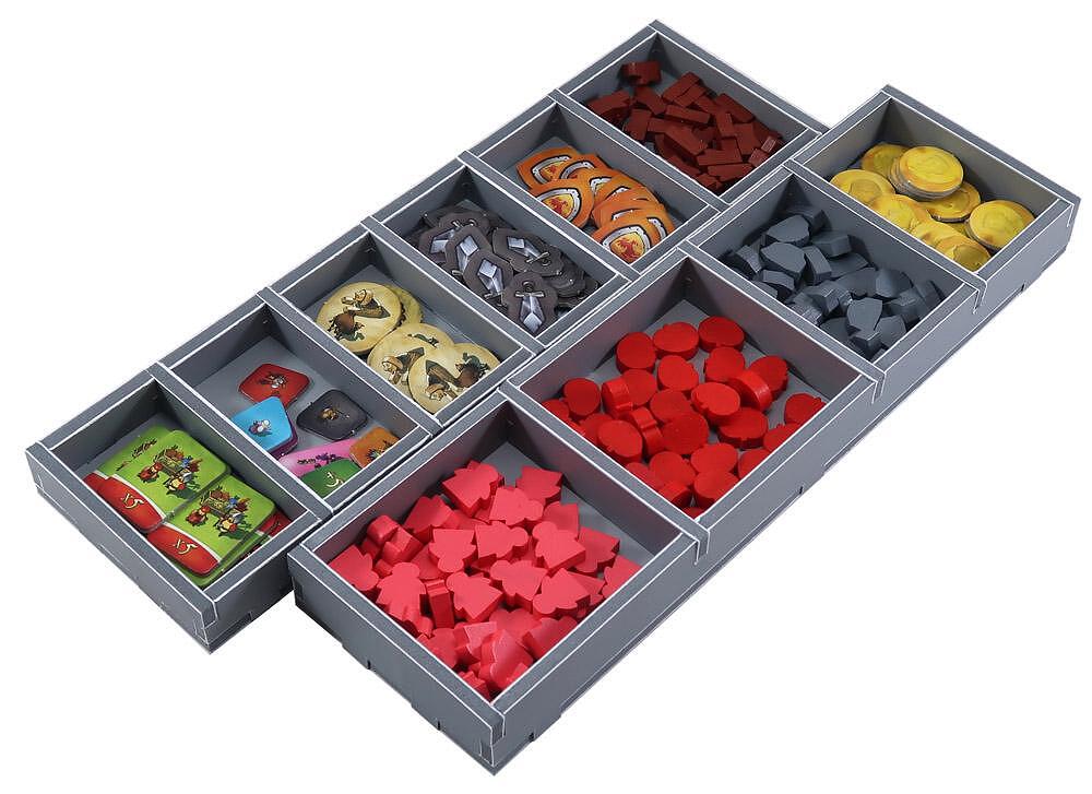 Insert organizer with compartments filled with dice and game tokens for Imperial Settlers