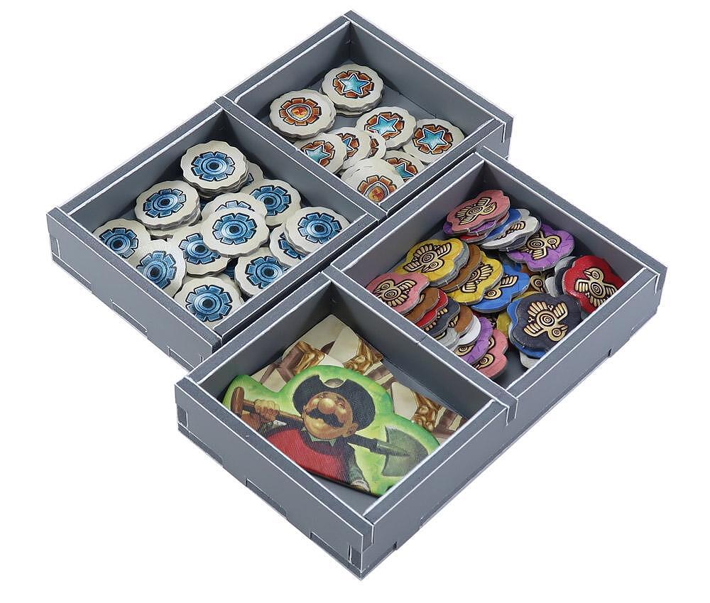 Folded Space insert in a box with cards and tokens arranged in labeled sections