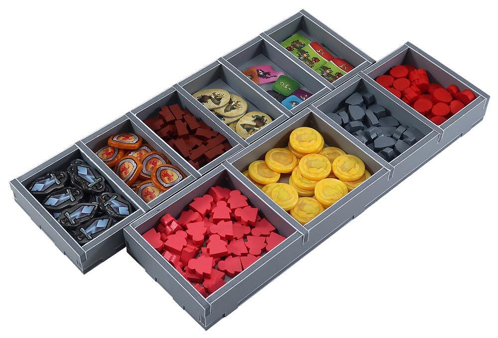 Folded Space organizer filled with cards, dice, and wooden pieces for the board games