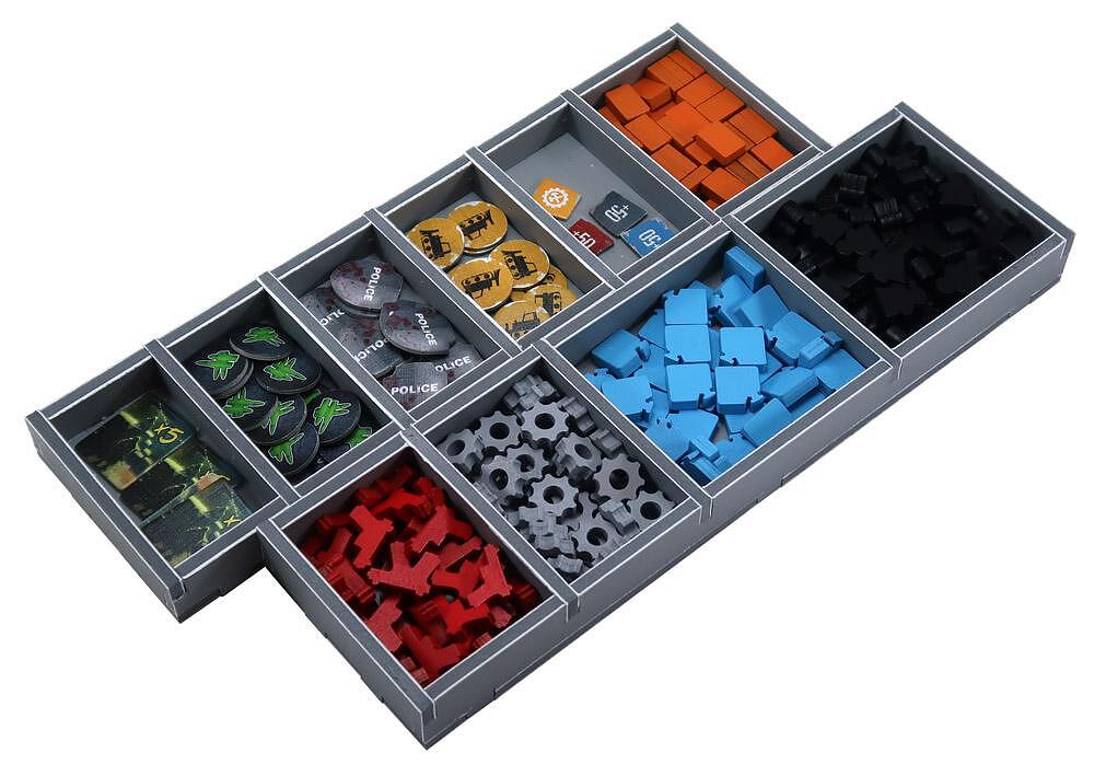 View of the insert organizer holding neatly stacked cards and various tokens