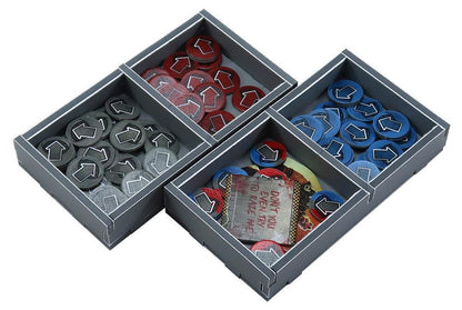 Insert organizer showing sorted components inside a board game box