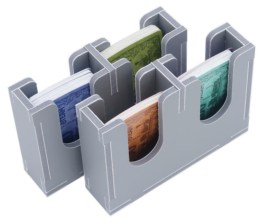 Close view of trays filled with sorted game pieces