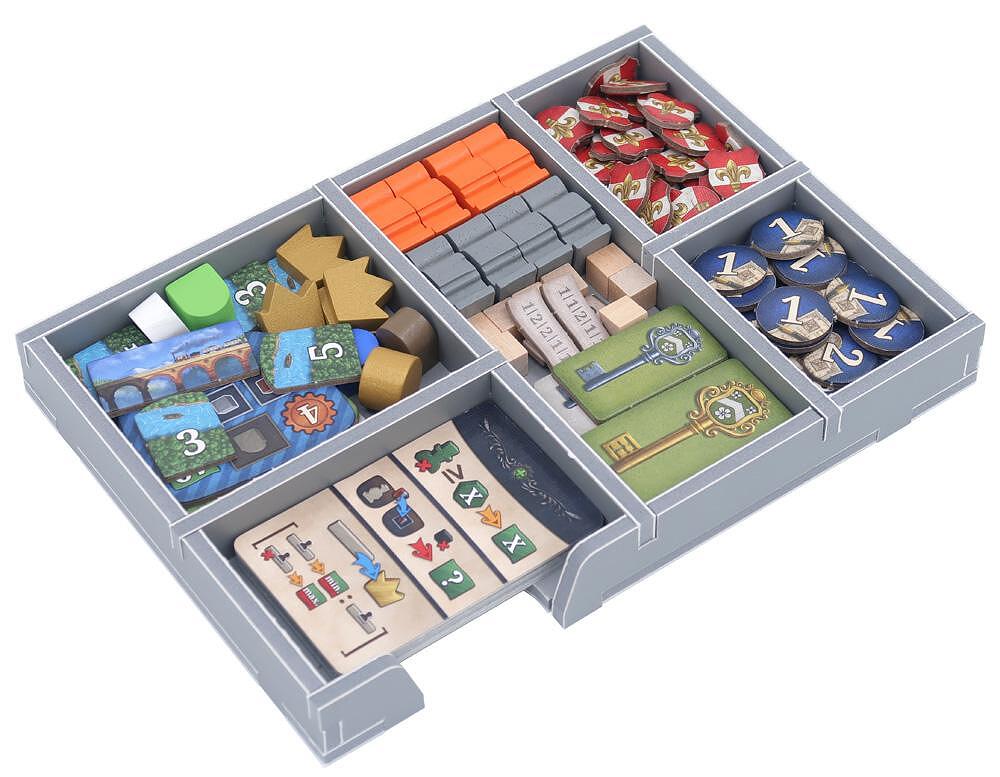 Game box with insert inside, showcasing storage layout