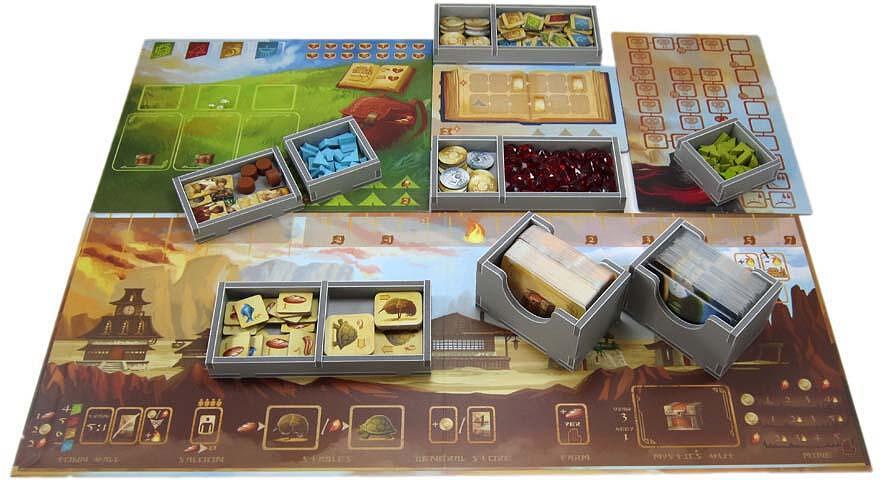 Open game box with all components stored using Folded Space insert for Near and Far
