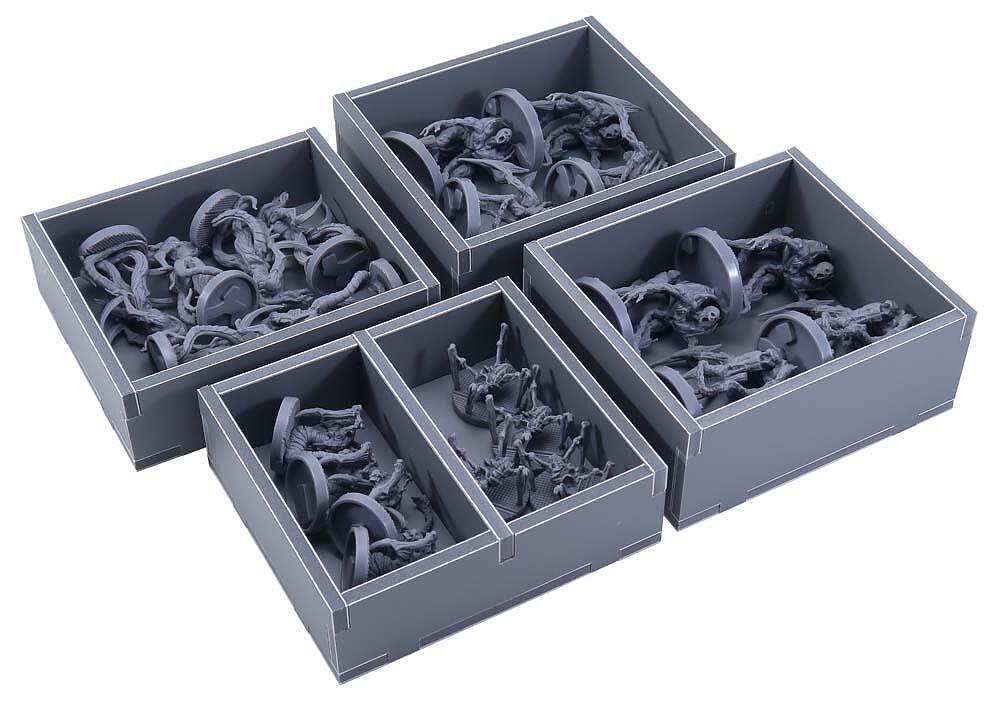 Side angle showing neatly packed game components inside the insert