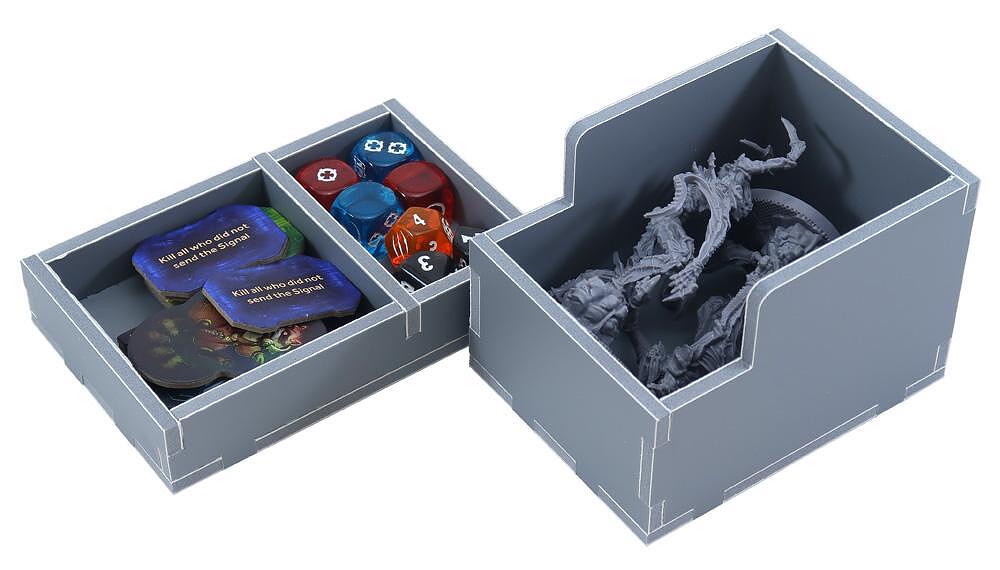 Separate trays from Nemesis Lockdown insert placed outside the box