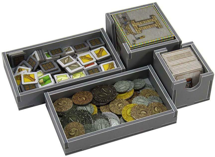Top-down view of the Orleans game organizer with components placed