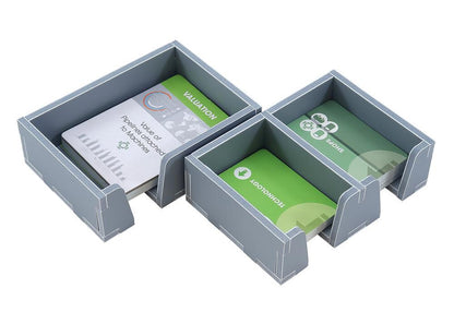 Organizer trays filled with sorted Pipeline game components