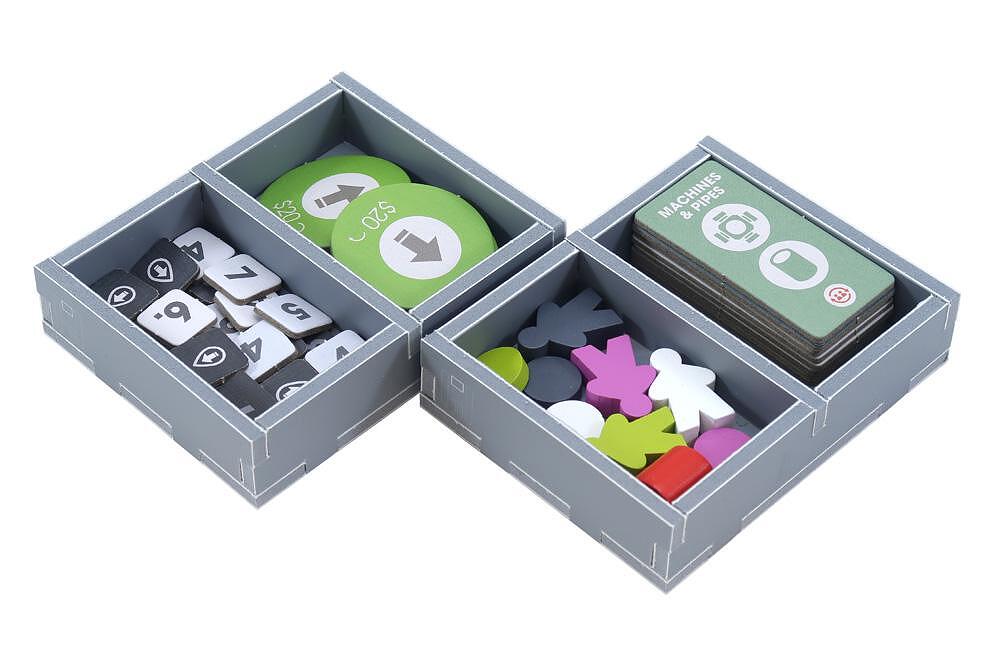 Close-up of card trays and component holders in Folded Space insert