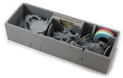 Close-up of game insert compartments storing Rising Sun tokens and cards