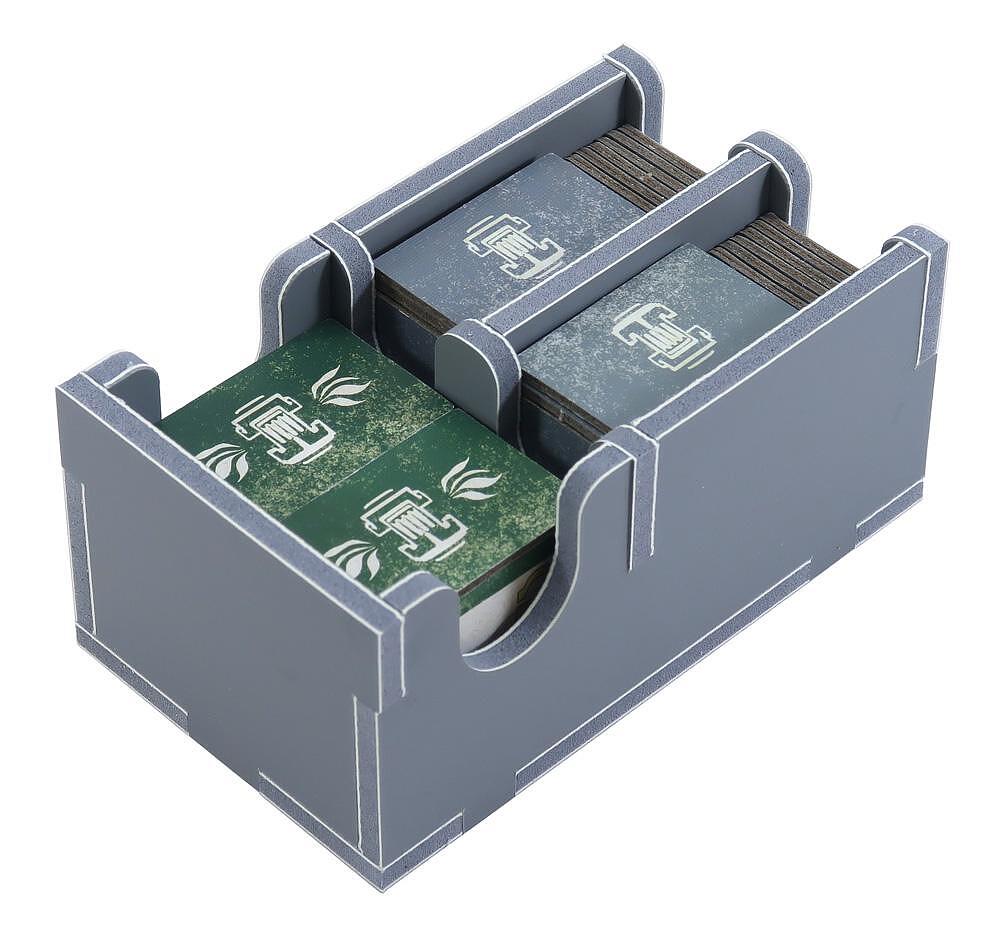 Game trays with resources and dice neatly arranged in insert for Teotihuacan