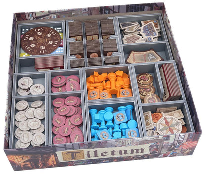 Folded Space insert with compartments filled with organized Tiletum game pieces