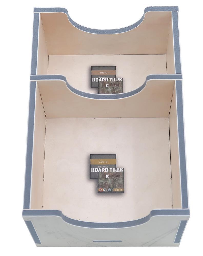 All insert trays neatly packed inside the Undaunted box