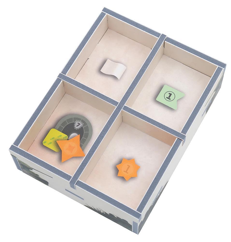 Complete view of the insert fully loaded with game components