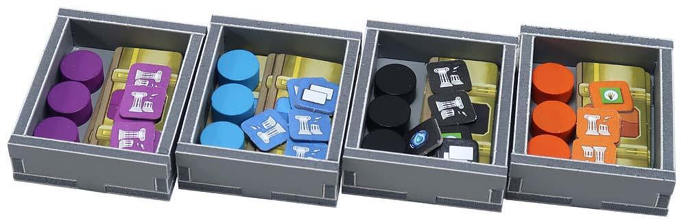 Angled view of the Folded Space organizer filled with game tokens and cards