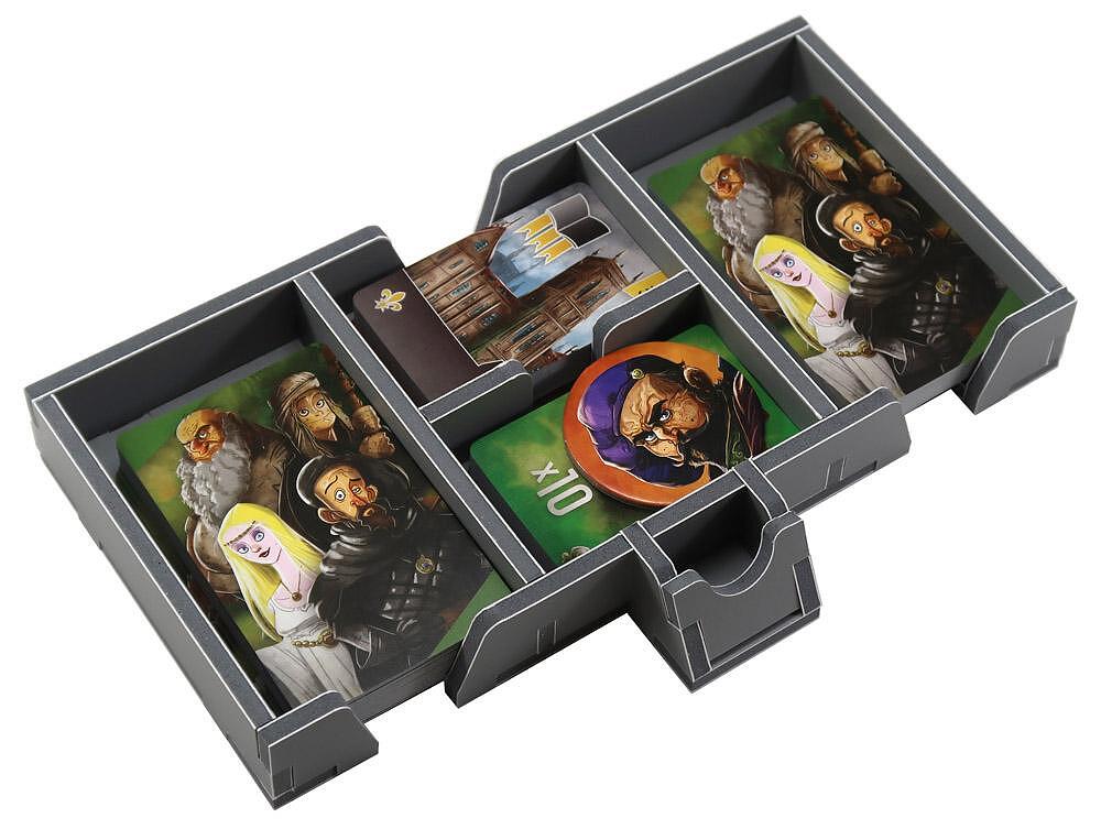 Close-up of Folded Space insert compartments holding wooden game components