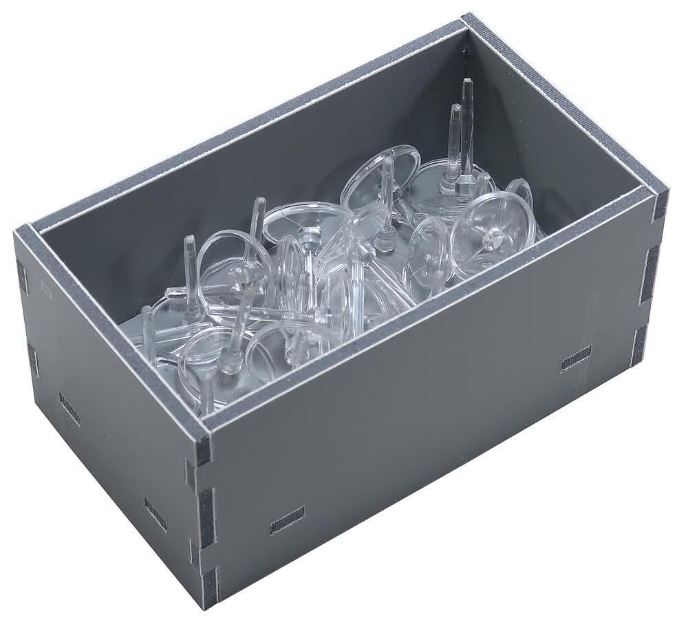 A gray box filled with clear plastic miniature bases