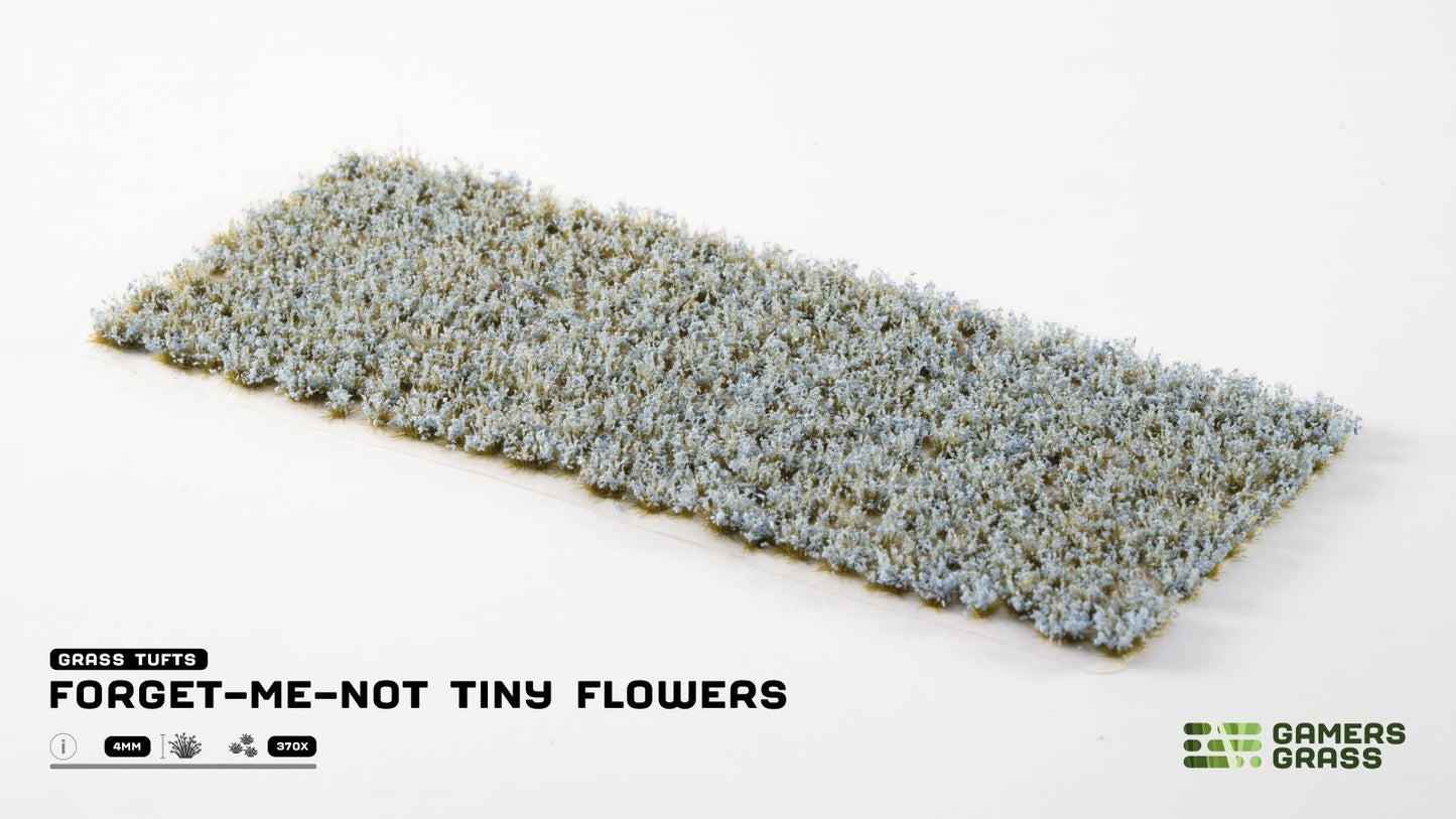 Miniature grass tuft sheet featuring tiny pale blue Forget-Me-Not flowers, used for models and dioramas