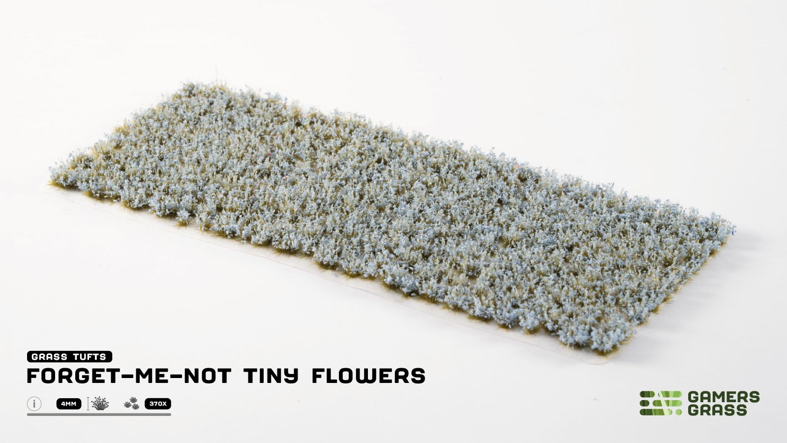 Miniature grass tuft sheet featuring tiny pale blue Forget-Me-Not flowers, used for models and dioramas