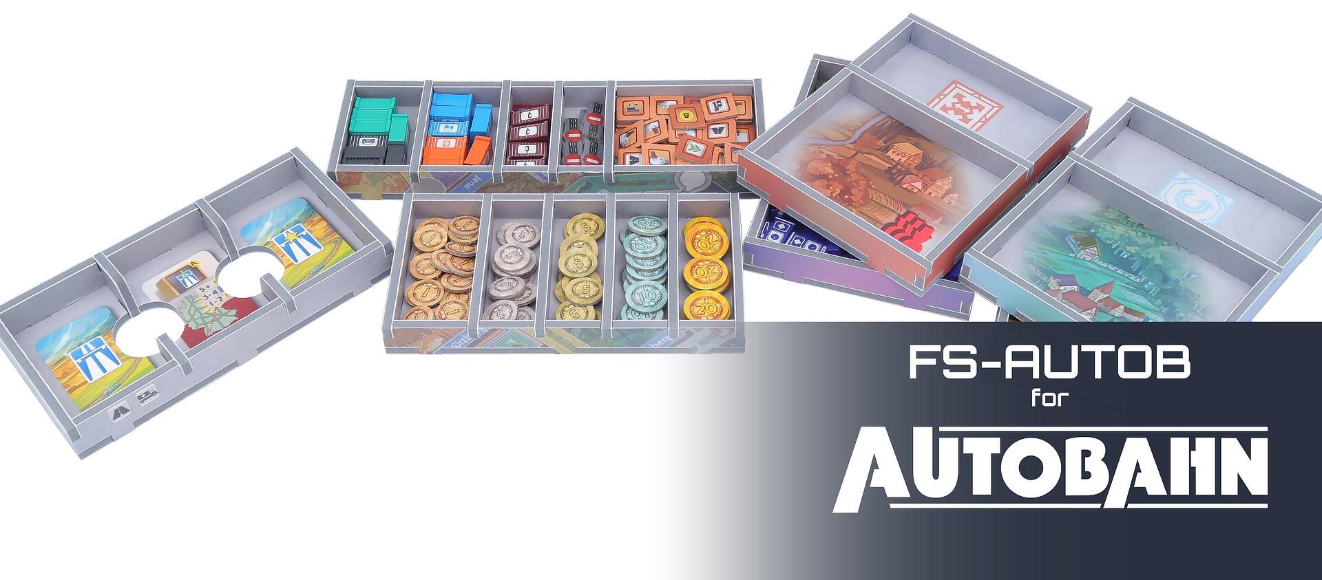 Overhead view of game insert with cards and tokens organized