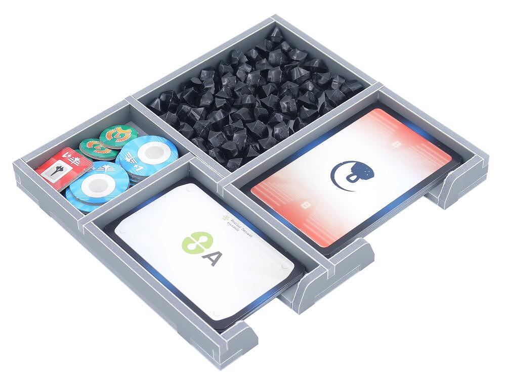 Gray board game organizer with game pieces, cards, and tokens