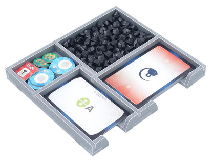 Gray board game organizer with game pieces, cards, and tokens