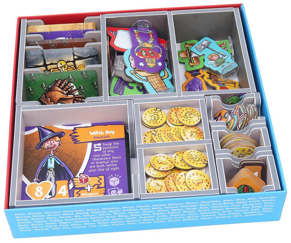 Open box of a board game with tokens, cards, and player pieces