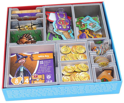 Open box of a board game with tokens, cards, and player pieces
