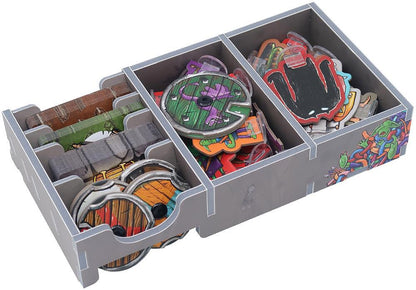 Board game organizer tray with tokens and miniatures, grey with colorful monster art