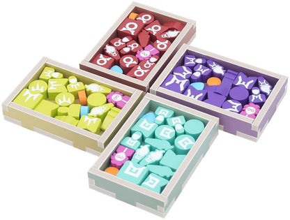 Four boxes of colorful game pieces, red, yellow, purple, and teal