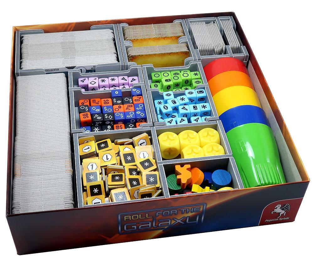 Top view of Folded Space insert with game components neatly organized in Roll for the Galaxy box