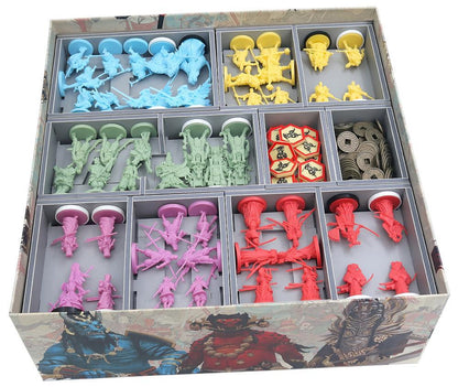 Game insert tray loaded with Rising Sun miniatures and cards, organized by type