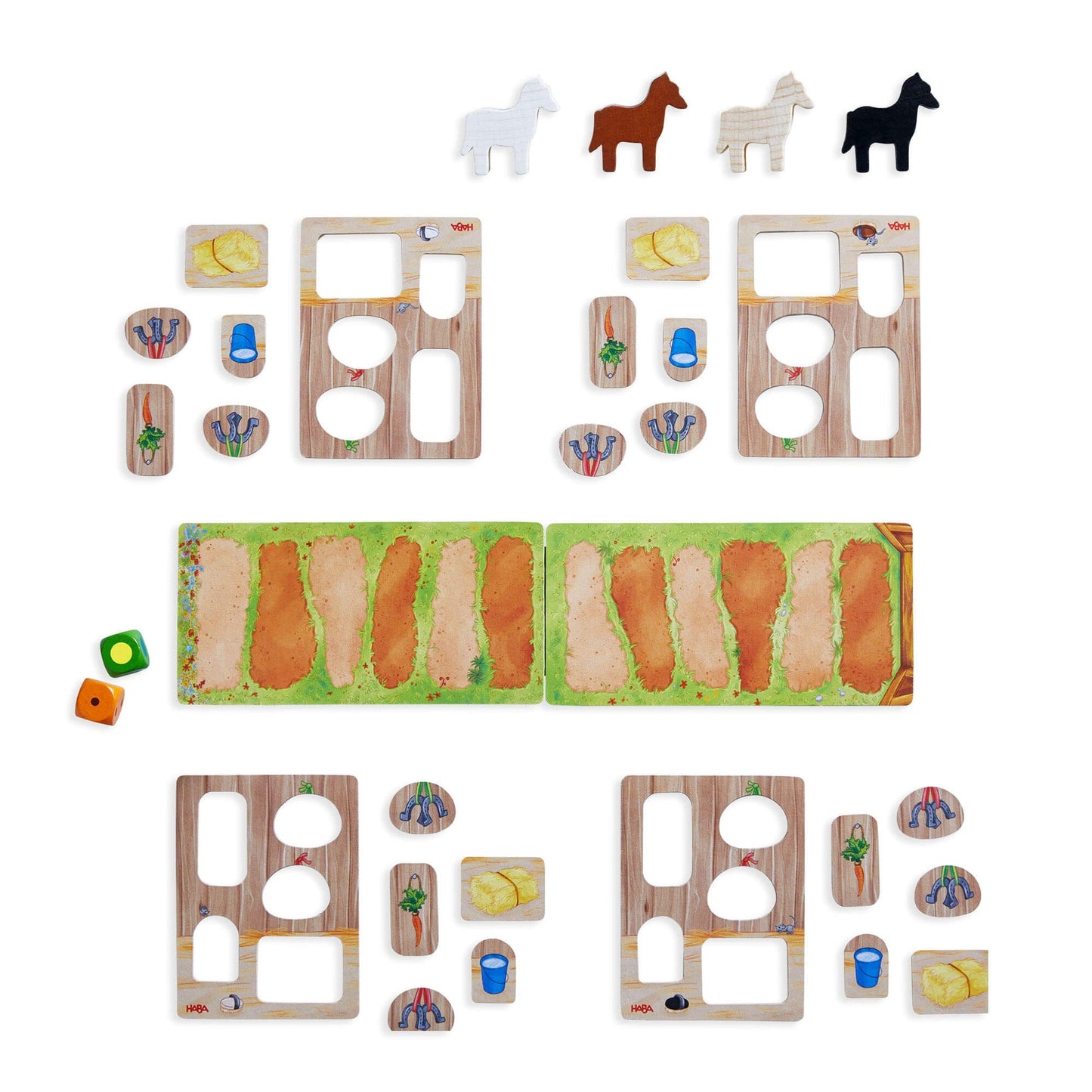 HABA farm game pieces: four horse figures, wooden barn boards, green field boards, assorted tokens, and two dice.