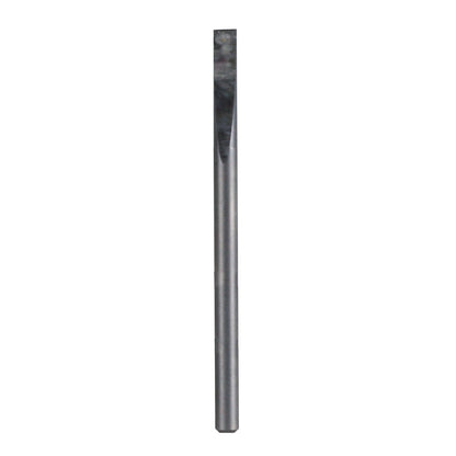 A slender metal chisel with a flat, beveled tip stands vertically