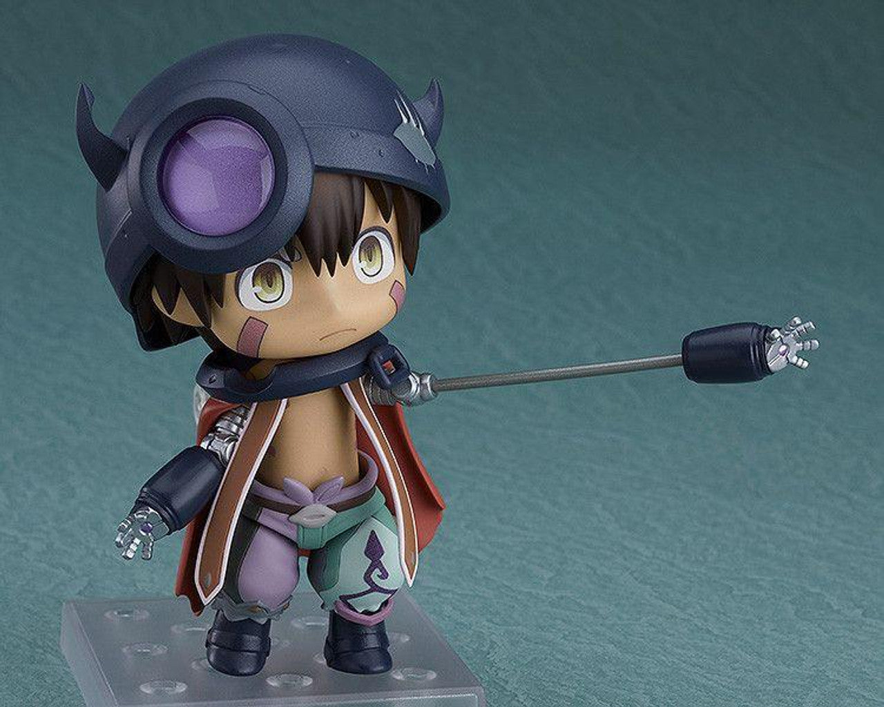Reg Nendoroid in action pose with extended mechanical arm and serious expression